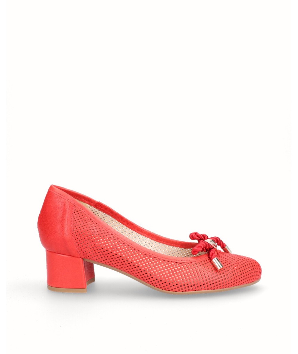 Red leather high-heeled lounge shoe with removable plant
