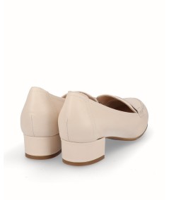 Beige leather heeled moccasin shoe