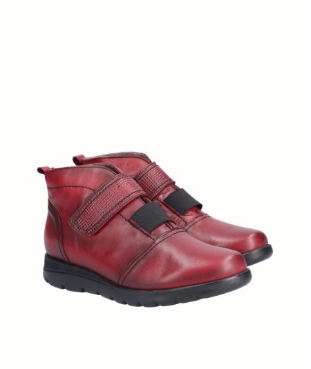 Flat red leather ankle boots with elastic and velcro closure