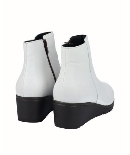 Polar white leather wedge ankle boots