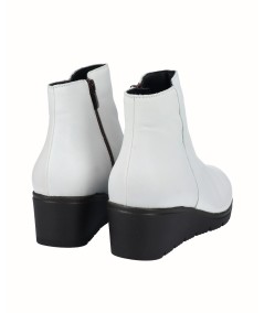 Polar white leather wedge ankle boots