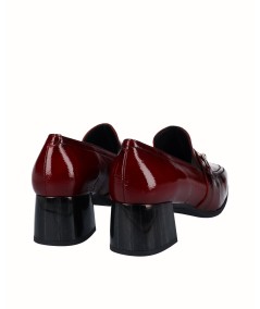 Burgundy patent leather high-heeled shoe