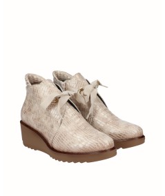 Beige embossed leather wedge ankle boots