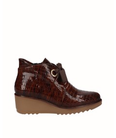 Engraved leather wedge ankle boot