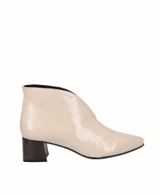Beige patent leather high-heeled ankle boots