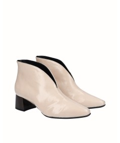 Beige patent leather high-heeled ankle boots