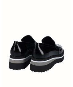 Black patent leather platform shoe