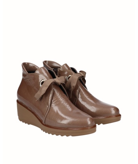 Brown patent leather wedge ankle boot