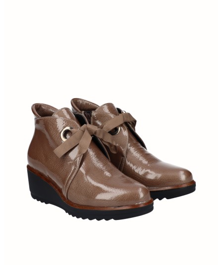 Brown patent leather wedge ankle boot